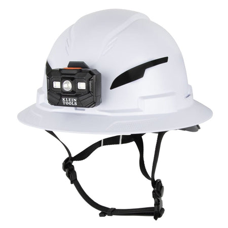 Studio view of the white Klein Tools Type 2 vented full brim hard hat featuring an attached rechargeable headlamp and chin strap.