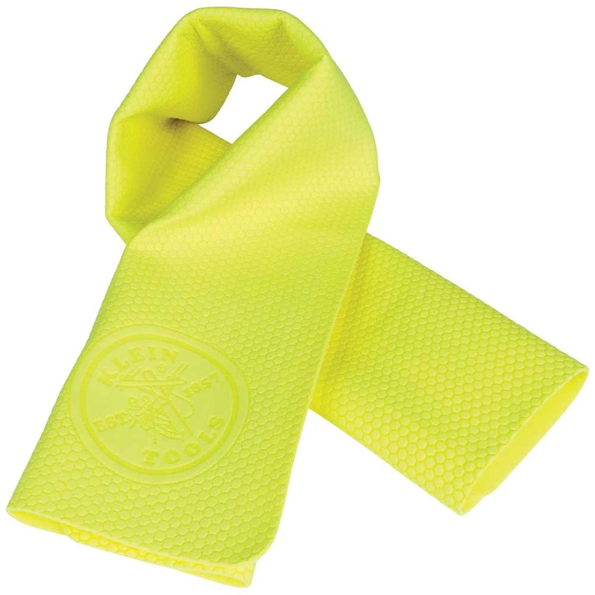 A clean product studio shot focusing entirely on one high-visibility yellow Klein Tools evaporative cooling neck wrap, showcasing its flexible PVA material construction and an embossed circular linesman emblem on the front tail end.