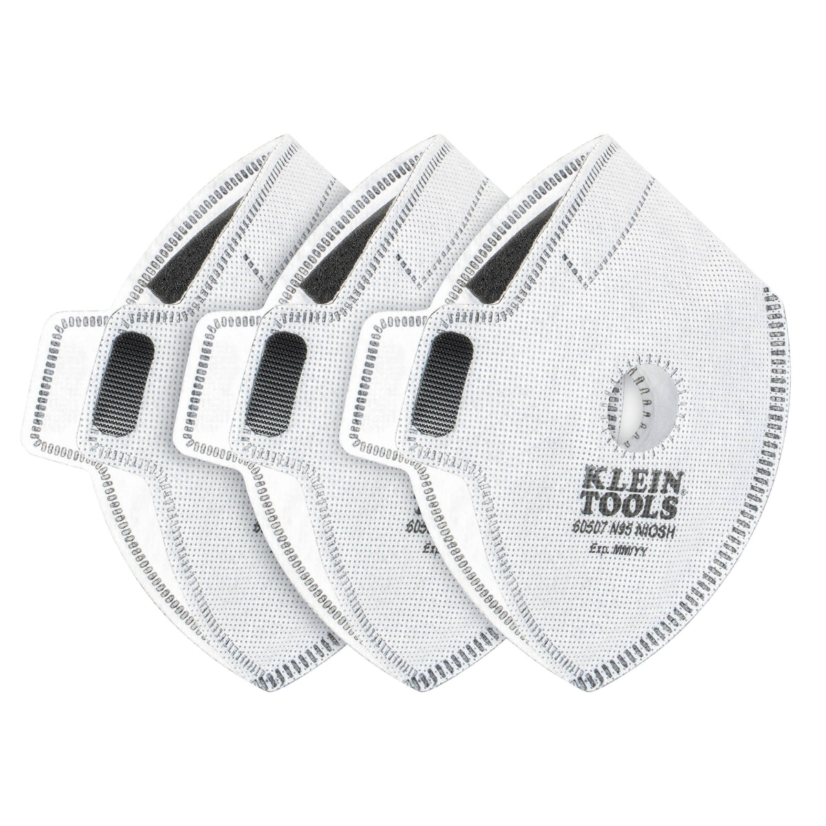 Three-pack of white Klein Tools 60507 N95 replacement filters for reusable face masks, showing their diamond shape, central exhalation valve port, grey hook-and-loop fastening patches, and official NIOSH approval markings.