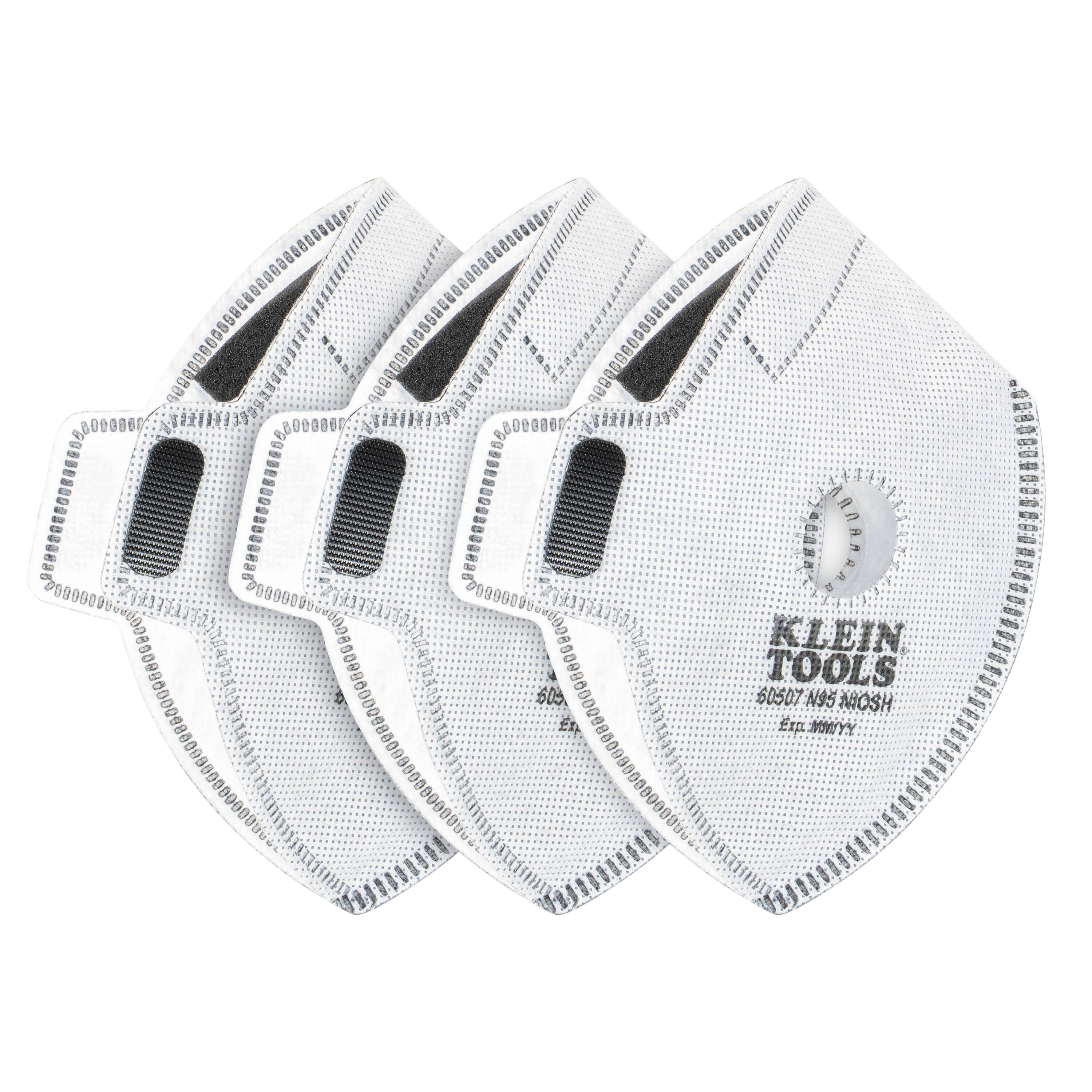 Three-pack of white Klein Tools 60507 N95 replacement filters for reusable face masks, showing their diamond shape, central exhalation valve port, grey hook-and-loop fastening patches, and official NIOSH approval markings.