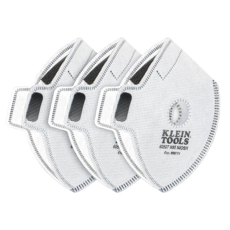 Three-pack of white Klein Tools 60507 N95 replacement filters for reusable face masks, showing their diamond shape, central exhalation valve port, grey hook-and-loop fastening patches, and official NIOSH approval markings.