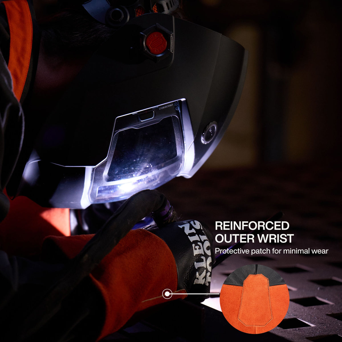 An action lifestyle shot focusing on the reinforced outer wrist of the Klein Tools welding glove. A circular detail zoom shows the protective patch engineered for minimal wear in high-friction areas while the technician performs a precision TIG weld.