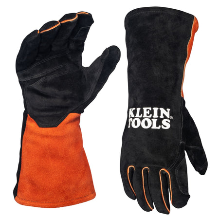 A studio product view of the Klein Tools 60915 MIG welding gloves. The image shows the palm and back views of the extra-large professional gloves, featuring durable black split cowhide leather hands with reinforced padding and long orange safety cuffs for heavy spark and spatter protection.