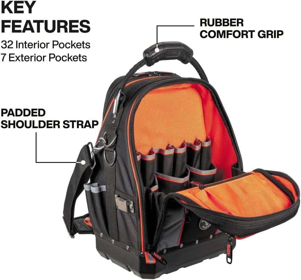 Angled view of the open bag showing the high-visibility orange interior with empty tool pockets, highlighting the padded shoulder strap and rubber grip.
