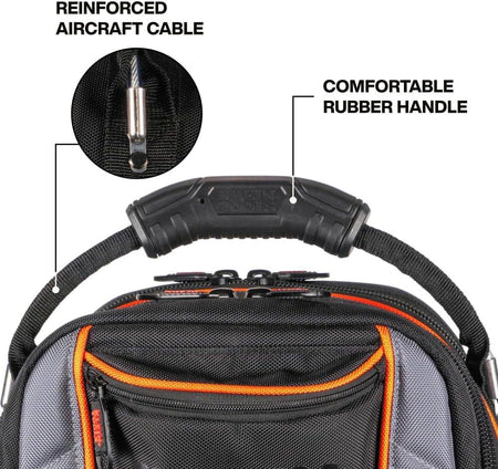 Detail shot of the bag's handle featuring a comfortable rubber grip and reinforced aircraft cable connections for durability.
