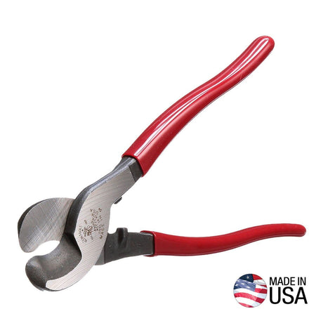 A professional profile view of the Klein Tools 63050 heavy-duty cable cutter in an open position, featuring ergonomic red double-dipped handles and through-hardened forged steel jaws designed for precision one-handed shearing, with a Made in USA logo.