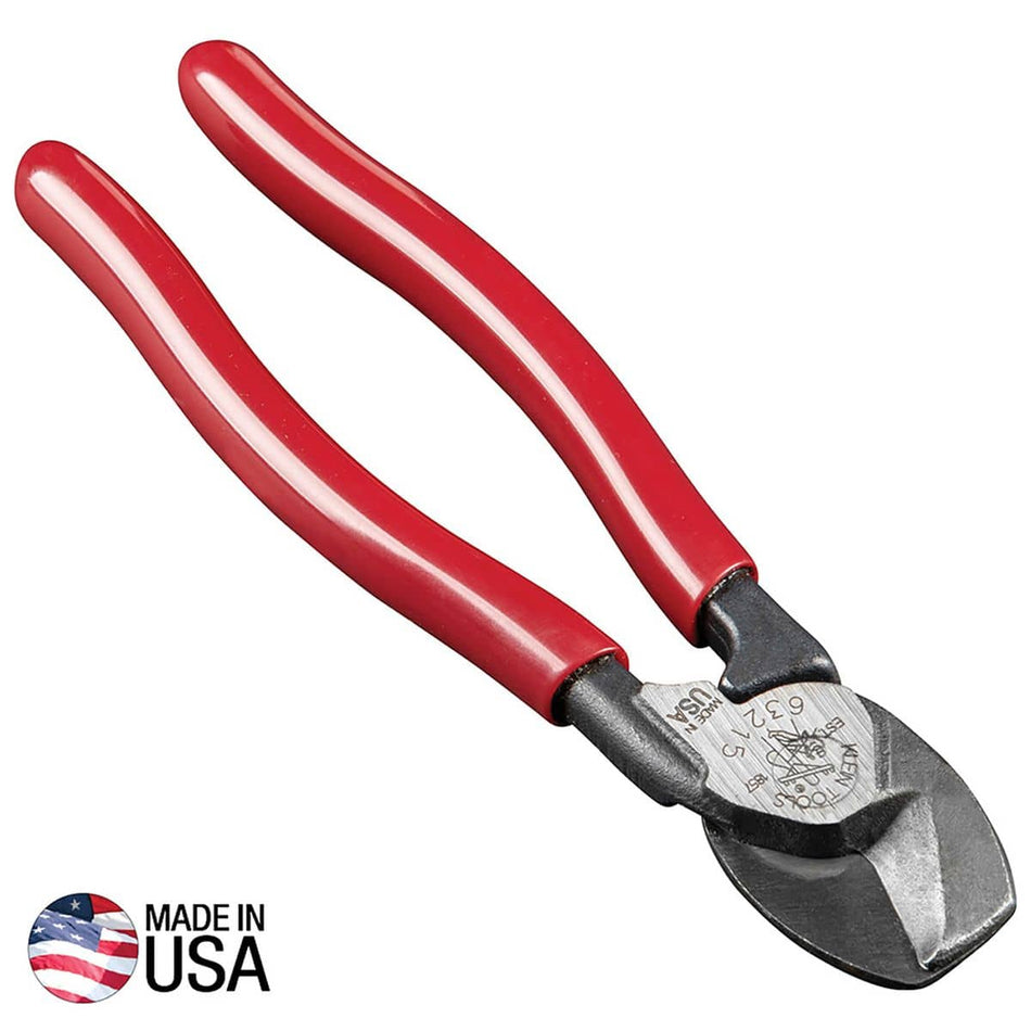 A professional side profile of the Klein Tools 63215 compact high-leverage cable cutter, featuring red plastic-dipped handles and precision-ground forged steel jaws designed for one-handed shearing, with a Made in USA logo.