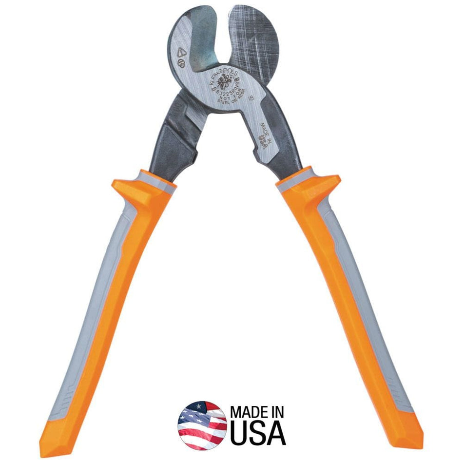 A professional front-facing profile of the Klein Tools 63225RINS 9-inch insulated cable cutter, featuring high-leverage forged steel jaws and dual-layer orange and gray 1000V rated handles, with a Made in USA logo.