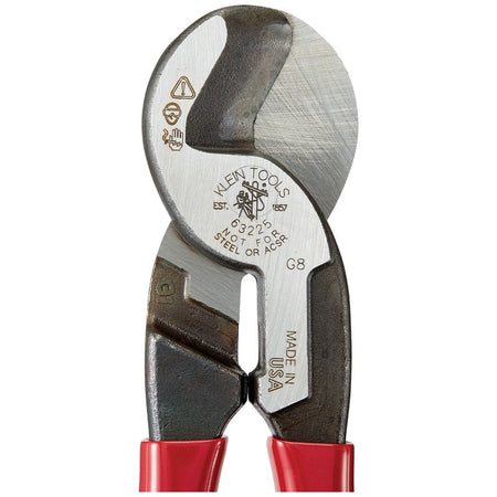 A detailed macro shot of the forged steel jaw head, highlighting the precision-machined shearing surfaces and the official laser-etched Klein Tools branding and "Made in USA" certification.