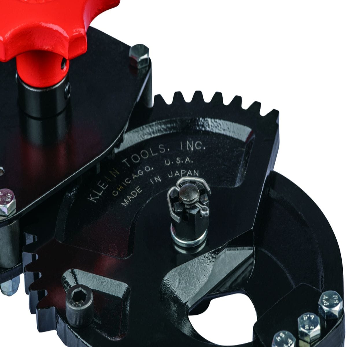 Detailed macro shot of the ratcheting gear teeth and movable shear blade, highlighting the precision-machined American steel construction and the high-carbon, heat-treated cutting surfaces.