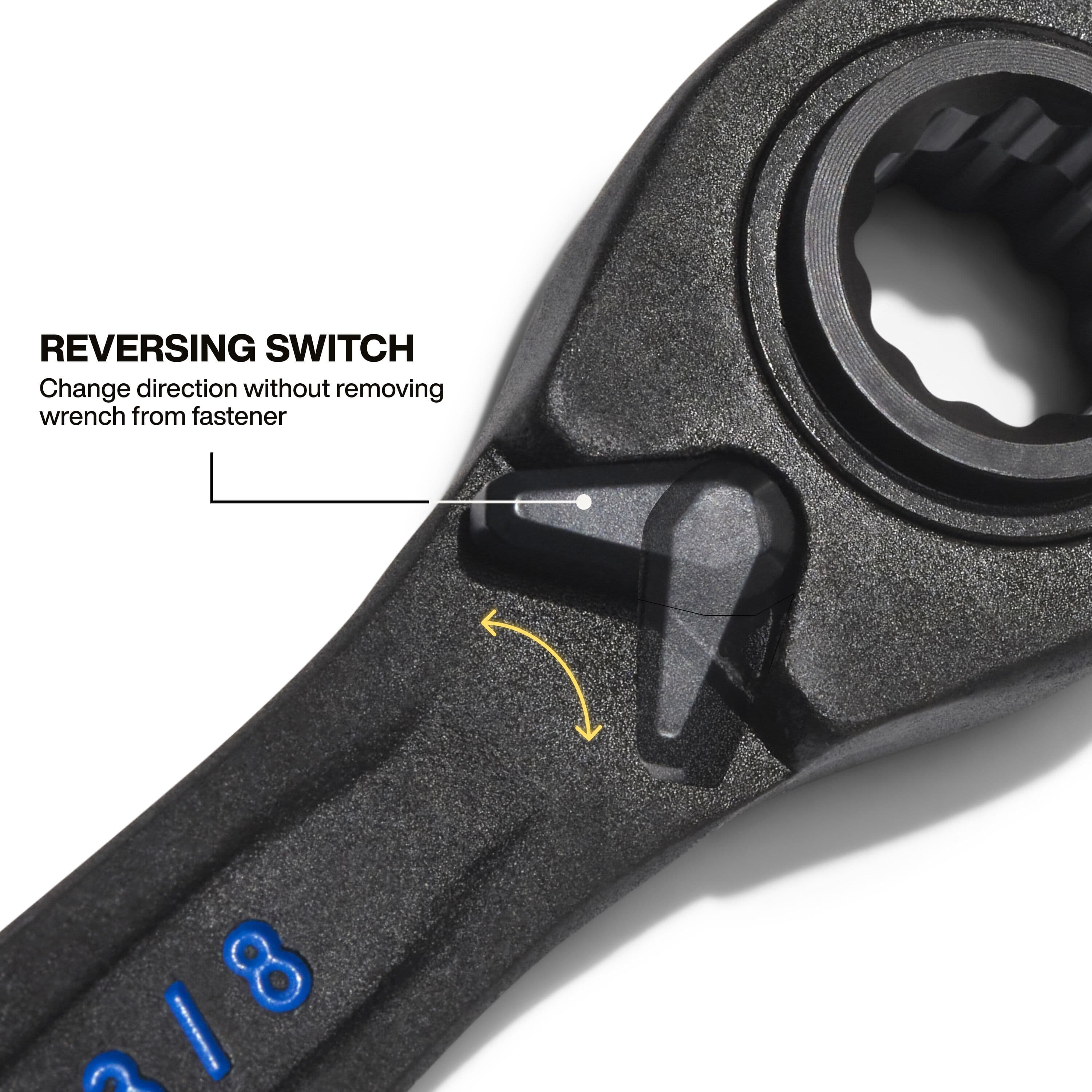 Detailed view of the integrated reversing switch on the ratcheting head, designed to allow users to change the tool direction instantly without removing the wrench from the nut or bolt.