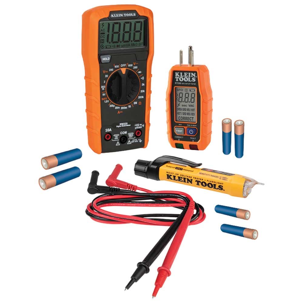 Complete Klein Tools 69355 premium electrical test kit layout including the MM320 digital multimeter, RT250 GFCI receptacle tester with LCD, and NCVT3P dual-range non-contact voltage tester with integrated flashlight. The kit is shown with high-quality right-angle test leads and six AAA batteries included.