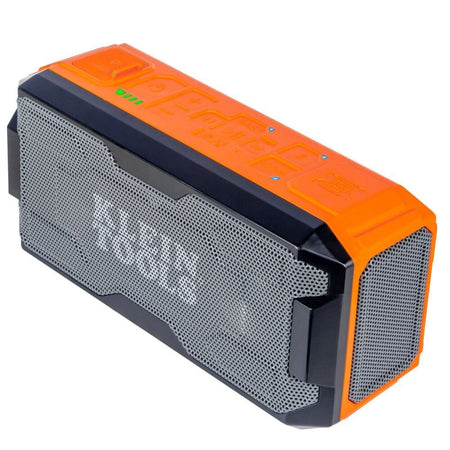 Top-down angled view highlighting the rubberized control buttons on the top panel and the rugged protective bumpers on the corners.