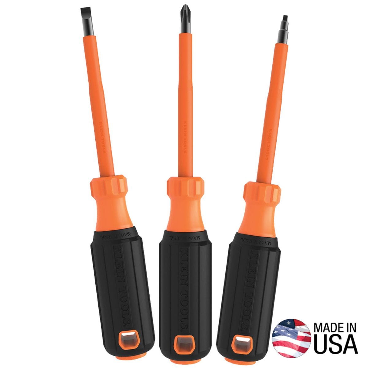 Klein Tools 85073INS 3-piece heavy-duty insulated screwdriver set arranged vertically in a fan layout, displaying three commercial electrician drivers with black cushion-grip handles, orange transition collars, and bright orange flame-resistant insulated shanks, featuring a Made in USA emblem on the lower right corner isolated on a white background.