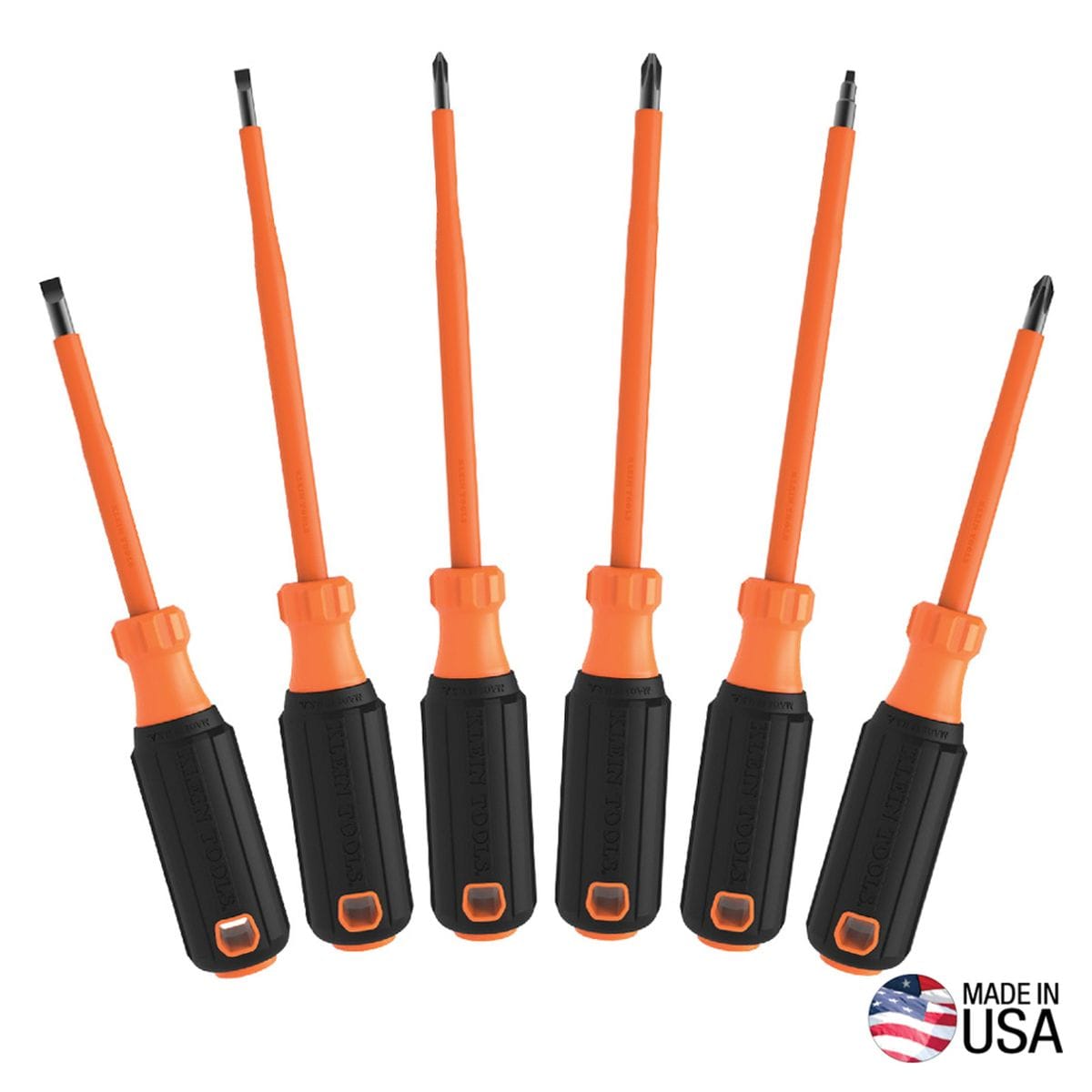 Klein Tools 85076INS 6-piece heavy-duty insulated screwdriver set arranged fanned out symmetrically, showing six commercial electrician drivers with black cushion-grip handles, orange transition collars, and bright orange dual-layer flame-resistant insulated shanks, featuring a Made in USA emblem on the lower right corner isolated on a white background.