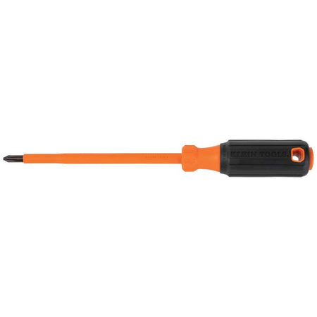 Klein Tools heavy-duty shock protection insulated screwdriver full horizontal layout, featuring a finely machined black alloy steel tip face integrated flush with an orange dual-layer insulated structural round shank, a rubberized black cushion-grip handle, and an integrated trailing safety lanyard anchor hole isolated on a white background.