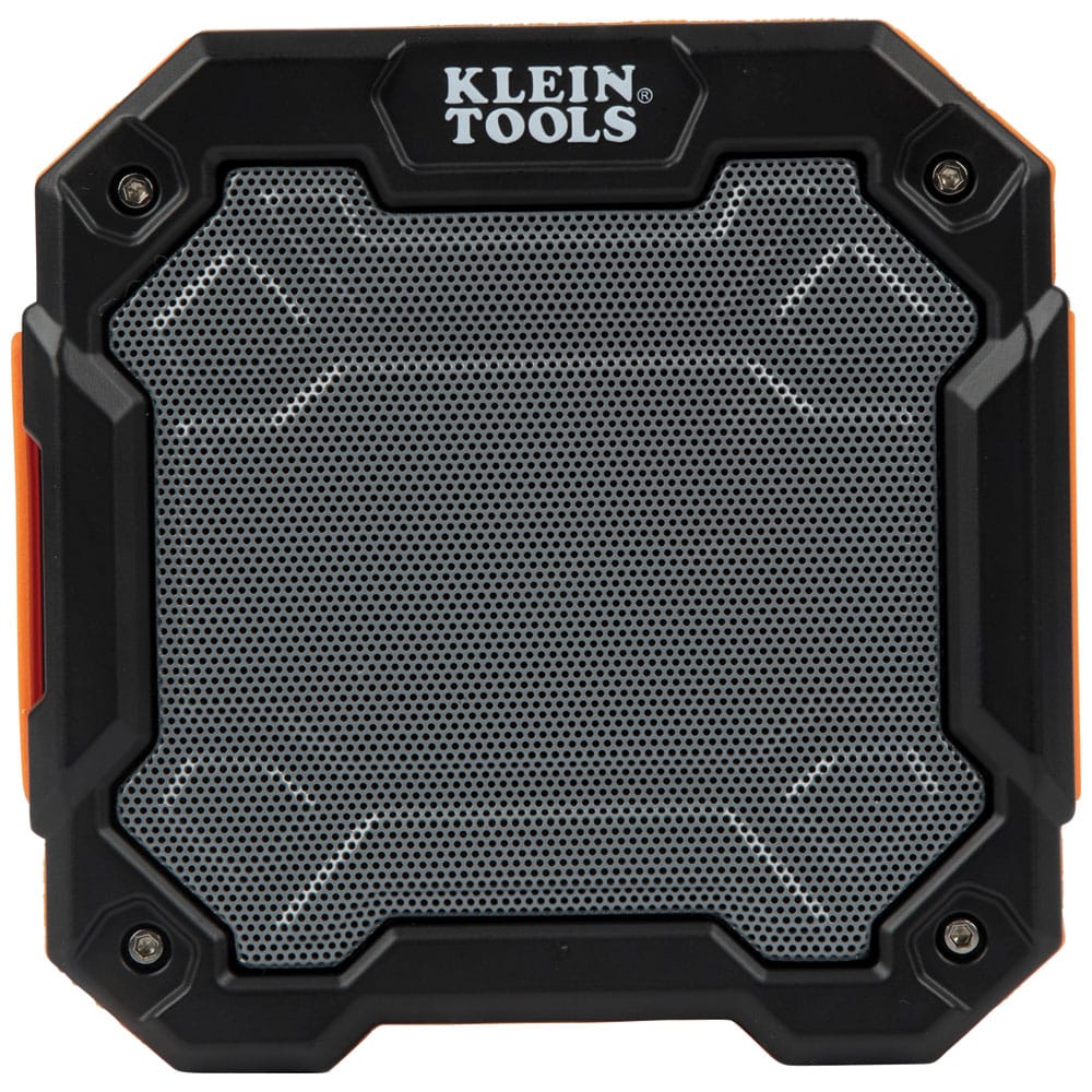 Straight-on front view of the Klein Tools AEPJS3 rugged jobsite speaker highlighting the metal speaker grill and the Klein Tools logo.