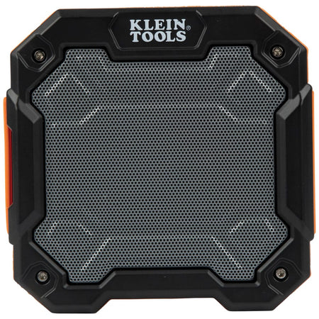 Straight-on front view of the Klein Tools AEPJS3 rugged jobsite speaker highlighting the metal speaker grill and the Klein Tools logo.