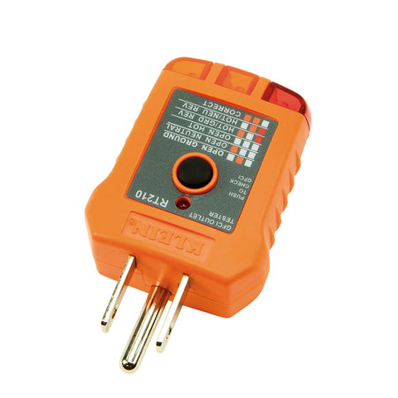 A perspective view of the Klein Tools RT210 GFCI outlet tester. The image shows the 3-prong plug and the reference chart on the face of the orange housing that allows users to quickly diagnose wiring conditions based on the LED light patterns.