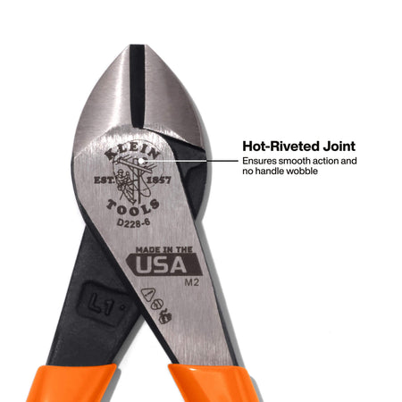 Close-up detail of the hot-riveted joint on the Klein Tools diagonal pliers, emphasizing the precision engineering that ensures smooth, one-handed operation and eliminates handle wobble during use.