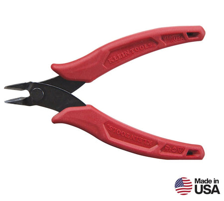 A perspective view of the Klein Tools D2755 precision flush cutter, featuring slim black heat-treated steel jaws and red textured handles.
