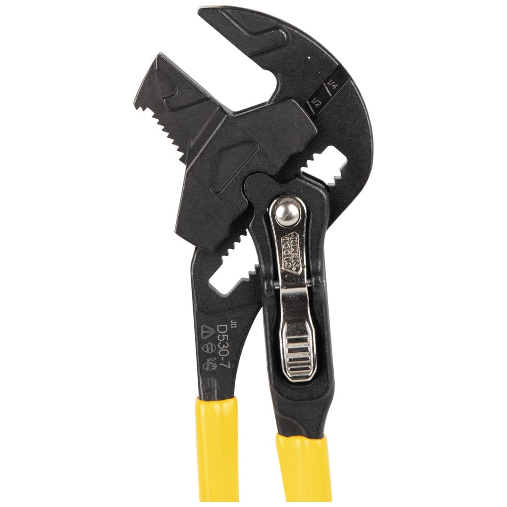 Close-up side view of the 7-inch Klein Tools plier wrench from the D53002KIT, showing the forged steel head, laser-etched size markings, and the push-button adjustment lever.