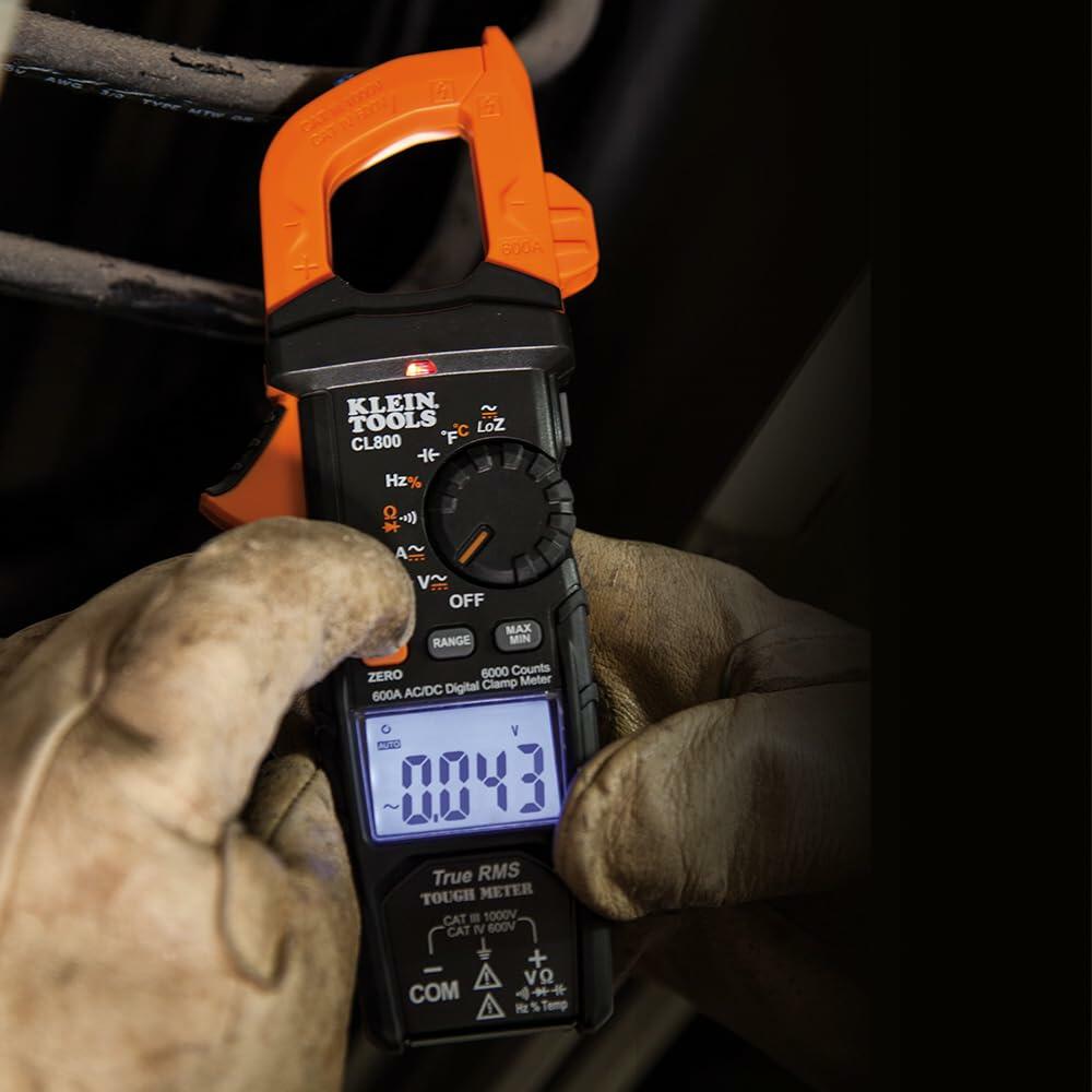 zQXbPpPVLGuLP4LorS1kj.jpeg
Person using Klein Tools CL800 clamp meter to measure AC current in an electrical panel, with display showing a reading of 0.04 amps.
