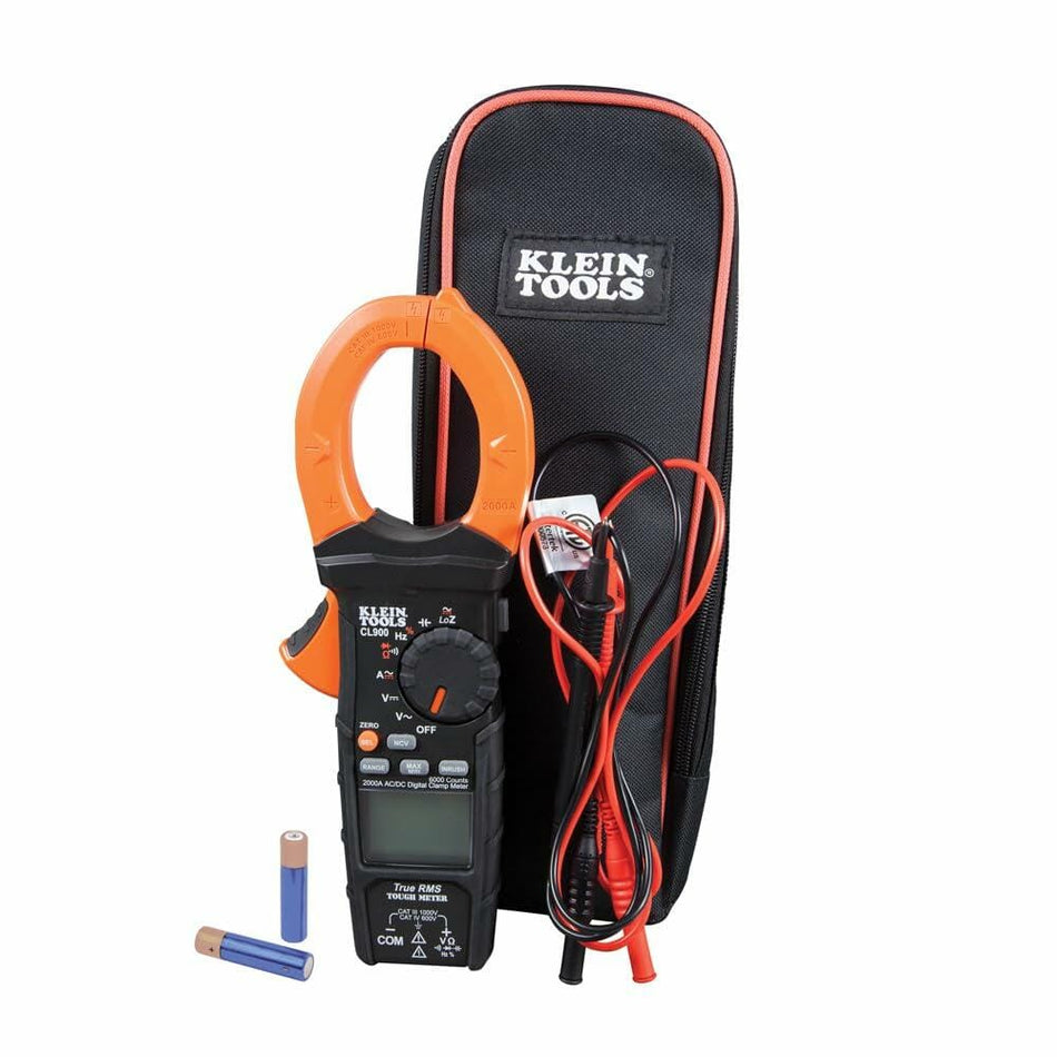 Klein Tools clamp meter kit with meter, red and black test leads, two AA batteries, and zippered carrying case for organized transport.