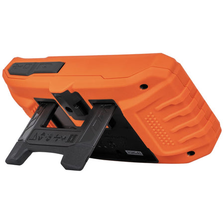 Rear perspective view of the Klein Tools ET17 borescope handheld monitor with its integrated self-storing kickstand fully deployed. The image highlights the rugged orange and black housing and the ergonomic design that allows the screen to stand upright on flat surfaces for hands-free industrial inspections.