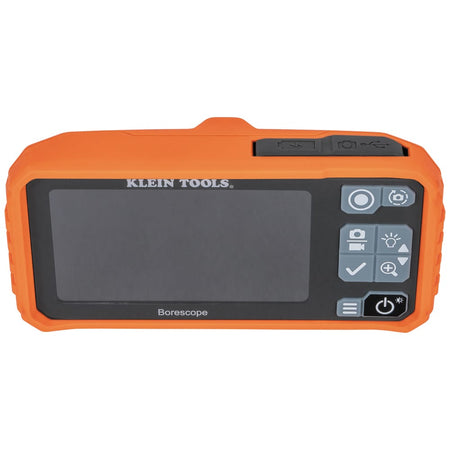 Top-down perspective of the Klein Tools ET17 borescope focusing on the weather-resistant port covers. These rugged seals protect the USB-C charging port and camera connection from jobsite dust and moisture, ensuring long-term professional reliability.