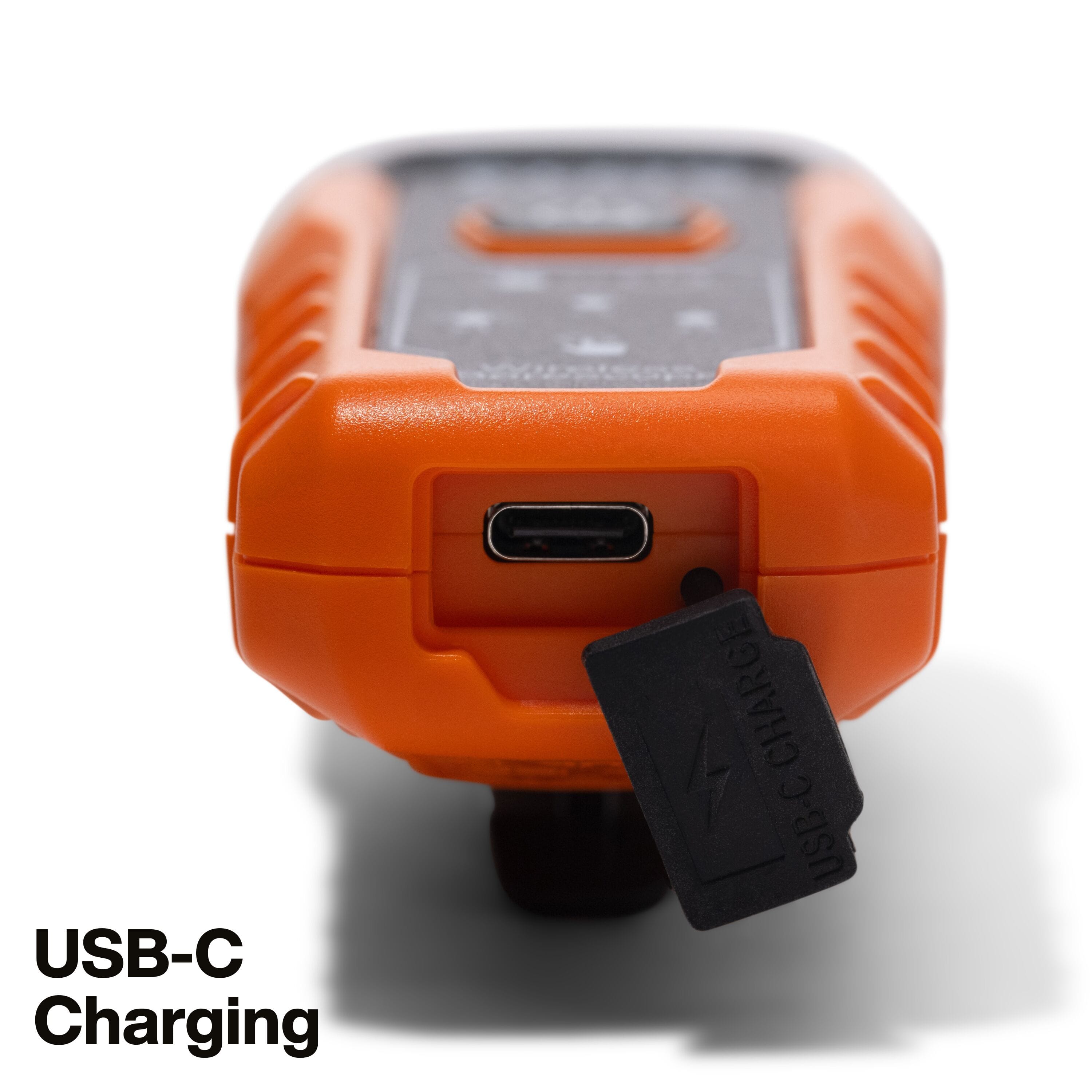 Detailed close-up of the bottom of the borescope transmitter showing the USB-C charging port protected by a durable black rubber weather-resistant flap.