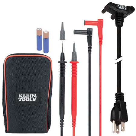 A complete product kit layout for the Klein Tools ET270, featuring the digital multimeter, two AAA batteries, a pair of right-angle test leads with a safety cap, the GFCI receptacle test cord, and a durable black carrying pouch with orange trim.