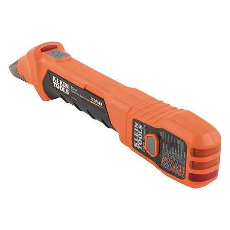 An angled view of the orange and black receiver wand lying flat, showcasing the power button, grip texture, and the sensing tip.