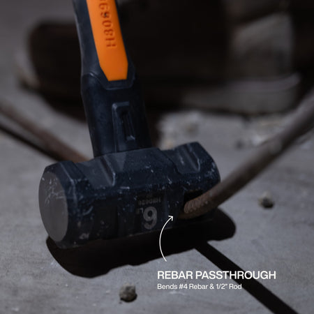 Lineman using the head passthrough on the Klein H80626 sledgehammer to manually bend a section of number 4 rebar on a jobsite.