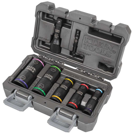 Open hard-shell carrying case displaying the Klein 66070 7-piece impact set with five color-coded flip sockets and two nested drive adapters.
