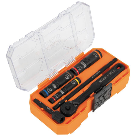 Angled view of the Klein 65238 flip socket kit open in its compact storage case, displaying internal socket trays and ratchet storage layout.