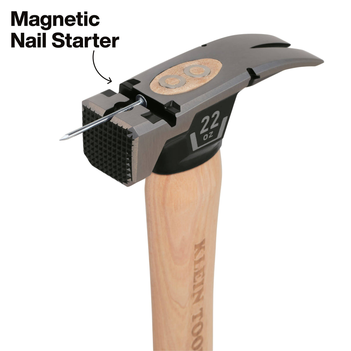 Detailed view of the milled hammer head highlighting the integrated magnetic nail starter, designed to securely hold a nail for efficient and safe one-handed setting during professional framing tasks.