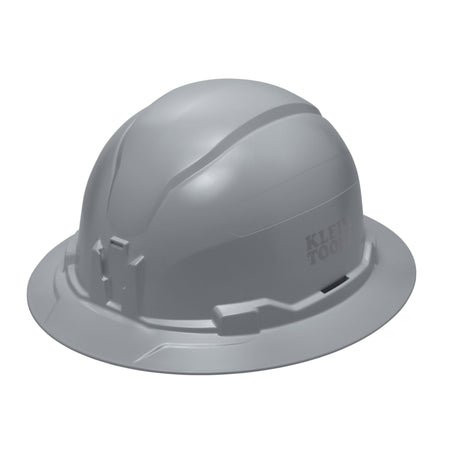 Klein 60863BR gray non-vented full brim safety hard hat featuring PC/ABS composite construction and integrated strap-free headlamp mounting brackets.