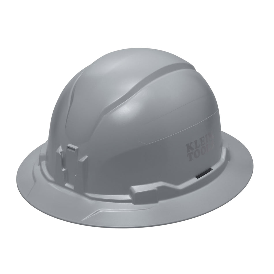Klein 60863BR gray non-vented full brim safety hard hat featuring PC/ABS composite construction and integrated strap-free headlamp mounting brackets.