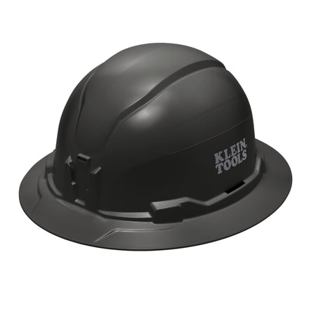Klein 60960 black non-vented full brim safety hard hat featuring PC/ABS composite construction and integrated strap-free headlamp mounting brackets.