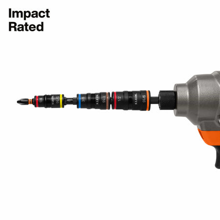 Klein 32303HD multi-bit driver assembly mounted into a cordless impact driver chuck to highlight high-torque power tool performance.