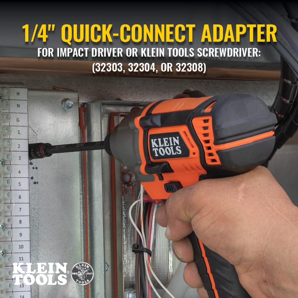 Electrician using the 3-inch Klein 32766 flip socket on an impact driver to secure ground terminal screws in a panel.