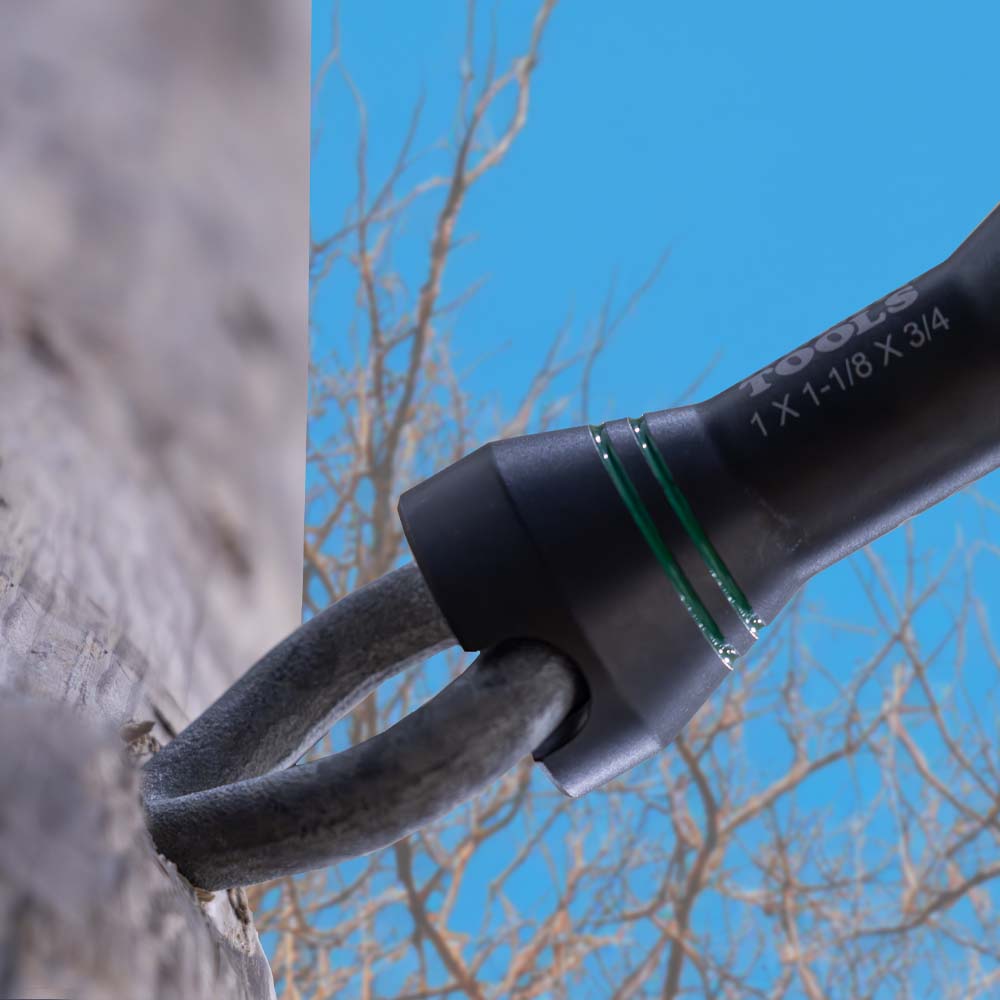 Klein NRHDM alignment slot engaged on a heavy utility pole eye bolt to torque hardware flush into wood framing.