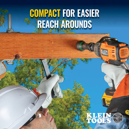 Lineman using compact Klein NRHDM socket on an impact driver to fasten pole hardware in tight crossarm clearances.