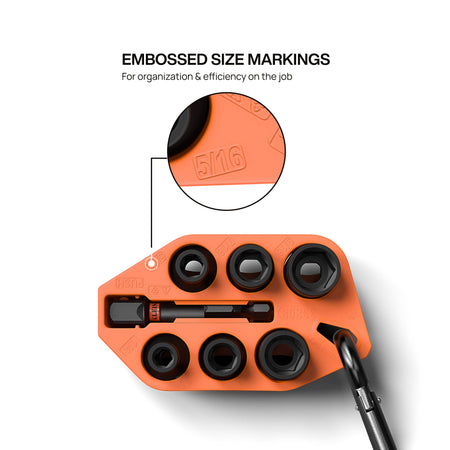 Top view of the orange TPV storage sleeve showing embossed 5/16-inch size markings and a center slot storing the 1/4-inch hex adapter.
