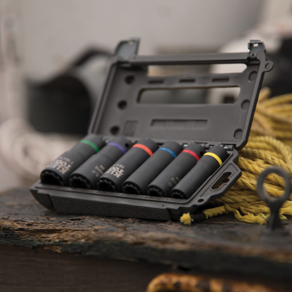 Open Klein hard case storing six color-coded 2-in-1 coaxial sockets to organize 12 SAE sizes on utility job sites.