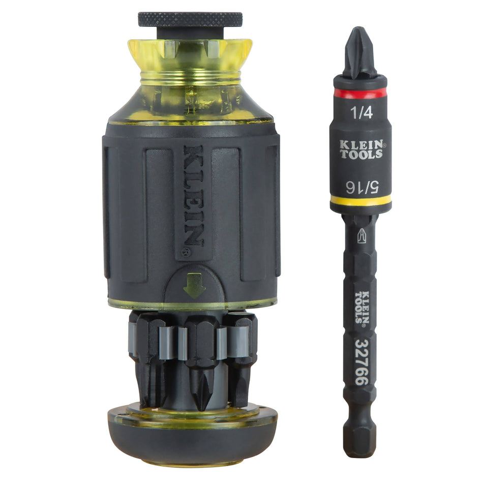 Klein 32308F stubby driver showing open internal storage bay with 7 bits alongside the 1/4 and 5/16-inch magnetic flip socket shaft.