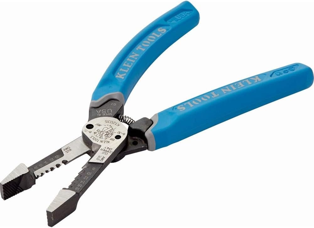 A studio product shot of the Klein Tools K12035 8-inch forged wire stripper and cutter, displaying the open jaws, textured comfort grips, and durable hot-riveted joint for smooth, wobble-free operation.