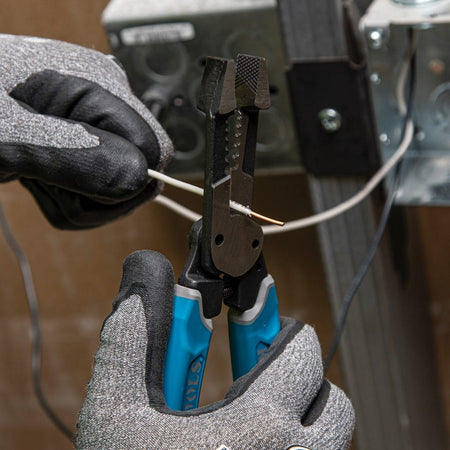 A studio product shot of the Klein Tools K12035 8-inch forged wire stripper and cutter, displaying the open jaws, textured comfort grips, and durable hot-riveted joint for smooth, wobble-free operation.