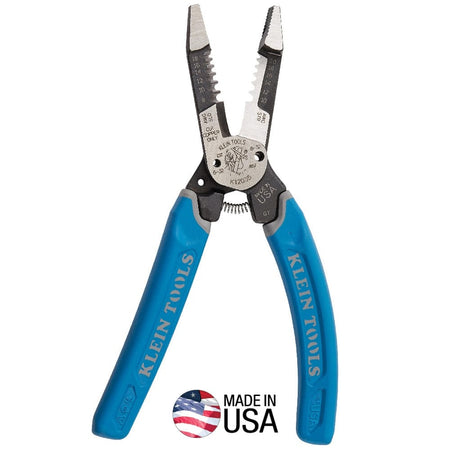 A professional product shot of the Klein Tools K12035 heavy-duty forged wire stripper and cutter, featuring blue and gray Klein-Kurve comfort grip handles and a precision-ground head with a Made in USA emblem.